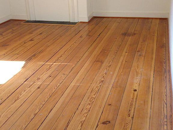 Living area with original floor.