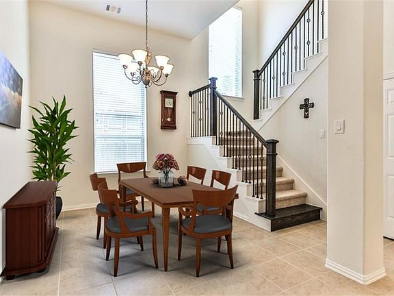 Formal dining room with beautiful tile floors