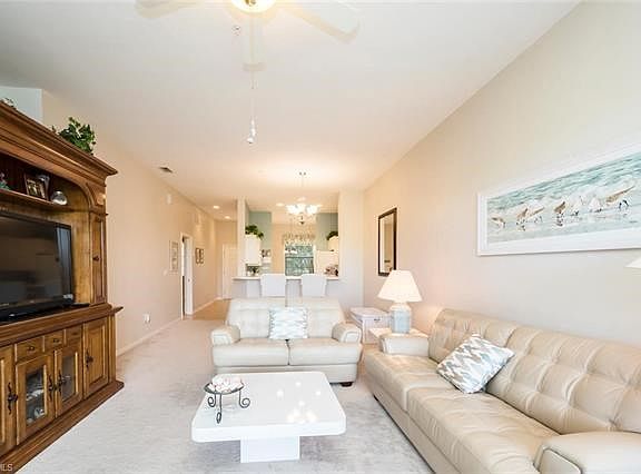 Living Room Looking into Dining Area and Kitchen