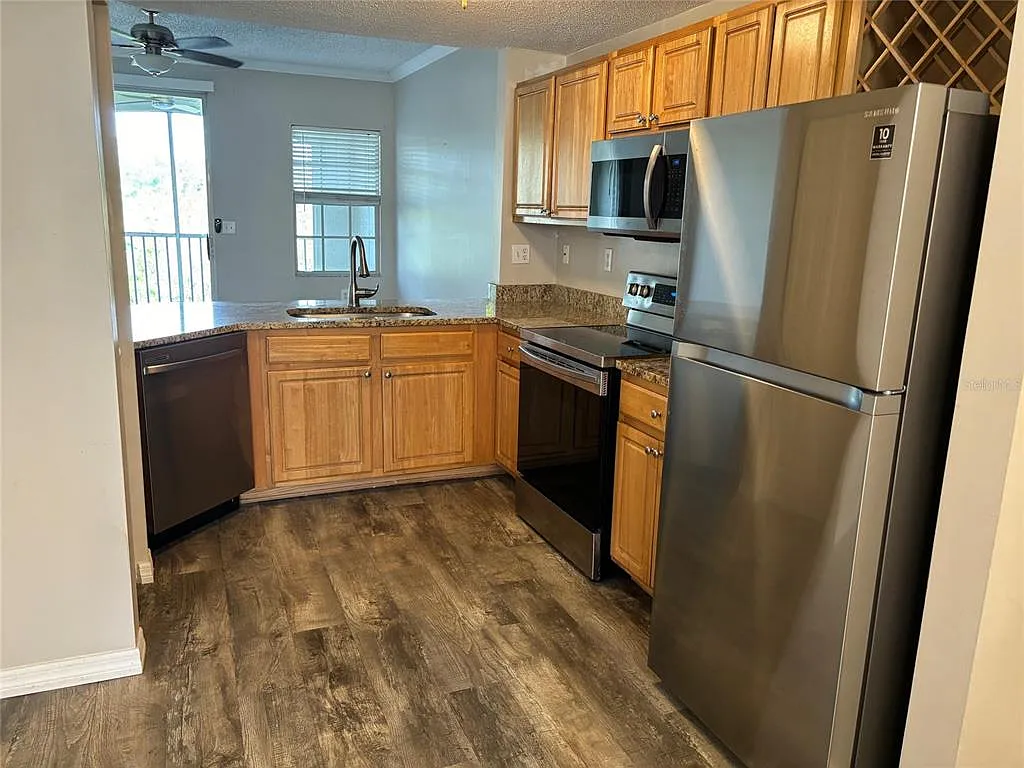 Building Photo - 5459 Bentgrass Dr #2-114
