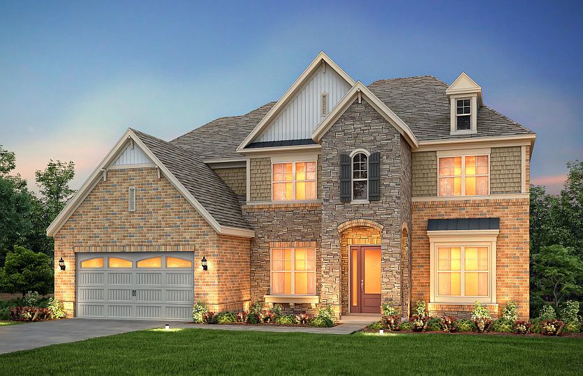 Worthington Exterior 8 features stone, brick, shakes and covered front door