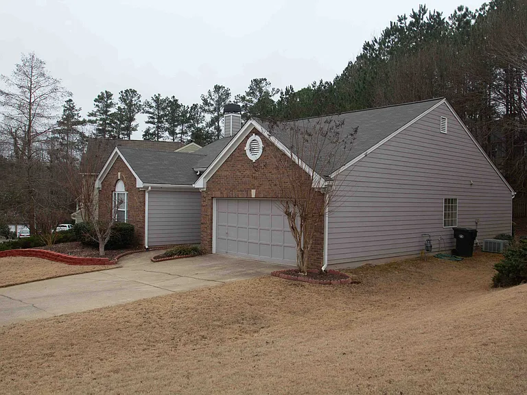 Spacious Front Lawn and Two Car Driveway.