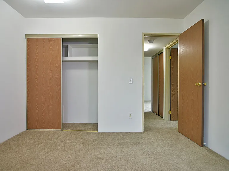 A bedroom at Charter Oak Apartments, Davison, Michigan