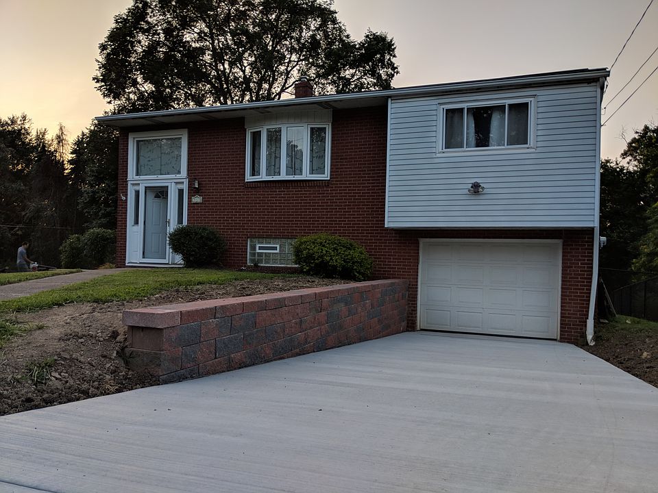 New concrete driveway and wall