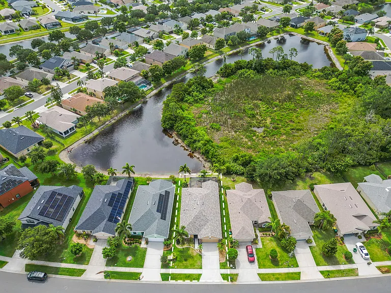 Aerial View of Home - Shows the size of the water view and the tree area