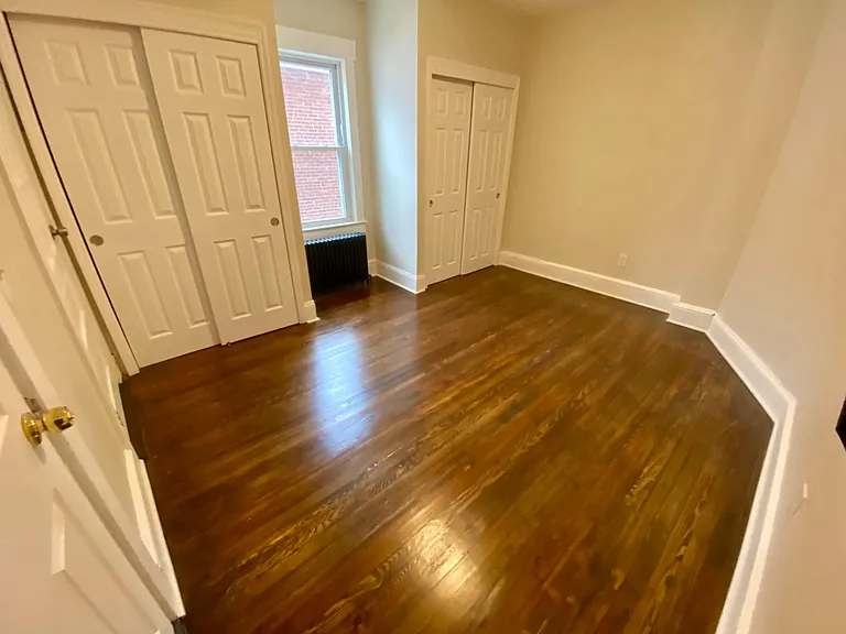 master bedroom with his-n-hers closets and full bath 10x13