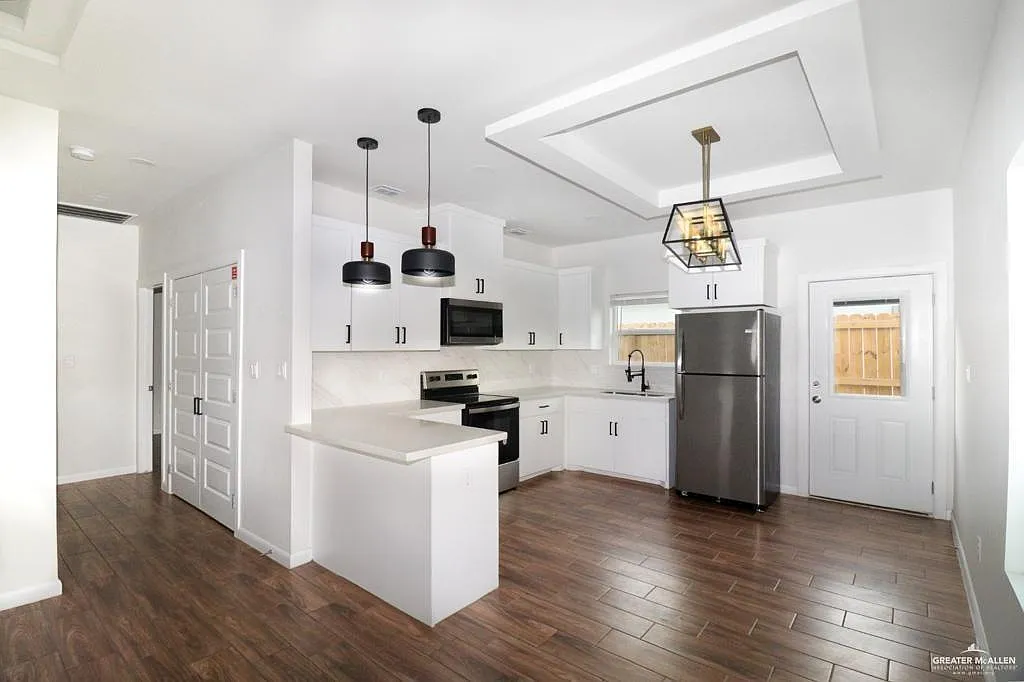 Building Photo - 1312 S Xanthia St #4