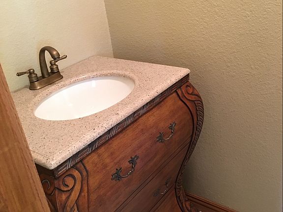 HALF BATH IN MUD ROOM