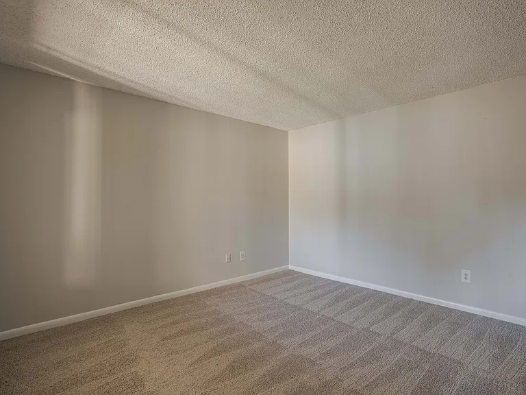 Step into this inviting bedroom space, ready to be personalized into your dream retreat.