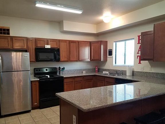 Granite kitchen with 2 fridges