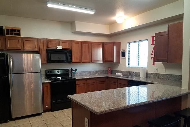 Granite kitchen with 2 fridges