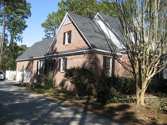Side view showing double driveway