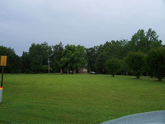 From street looking toward the house. Nature's beauty at its best.