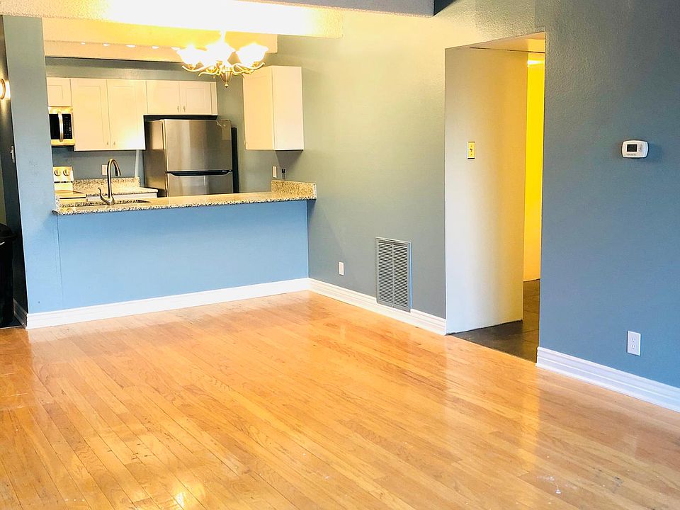 Open concept living room, dining room and kitchen