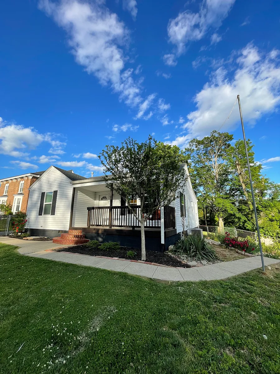 Corner lot with driveways in front and on the side of house. - 353 N Madison Ave