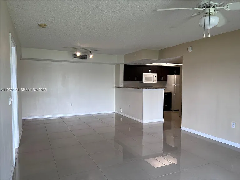5061 Wiles Rd #102 — Photo 3
