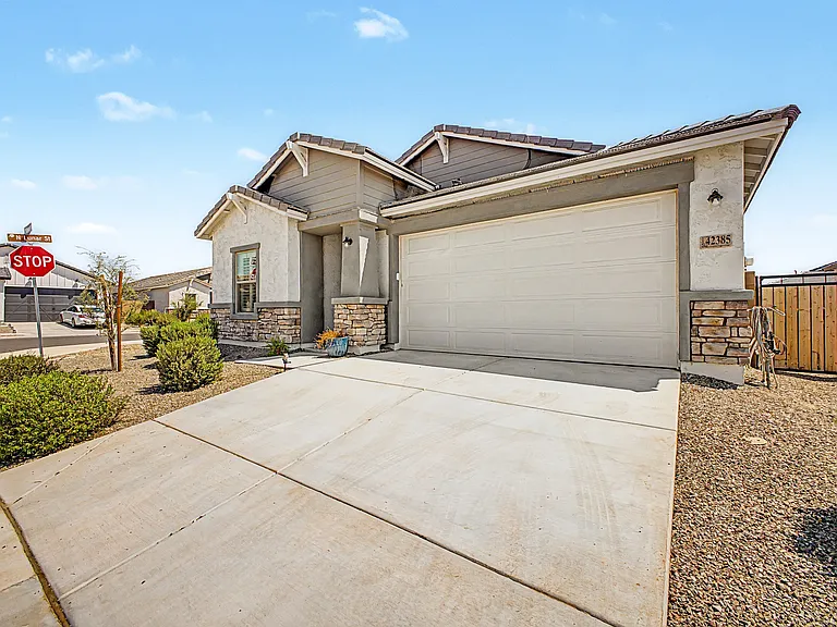 Front House with Garage and driveway. 4 parking spaces