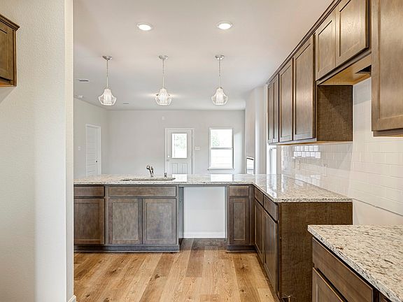 The Caldwell- Kitchen. Home under construction. Sample floor plan photo used for illustrative purpo