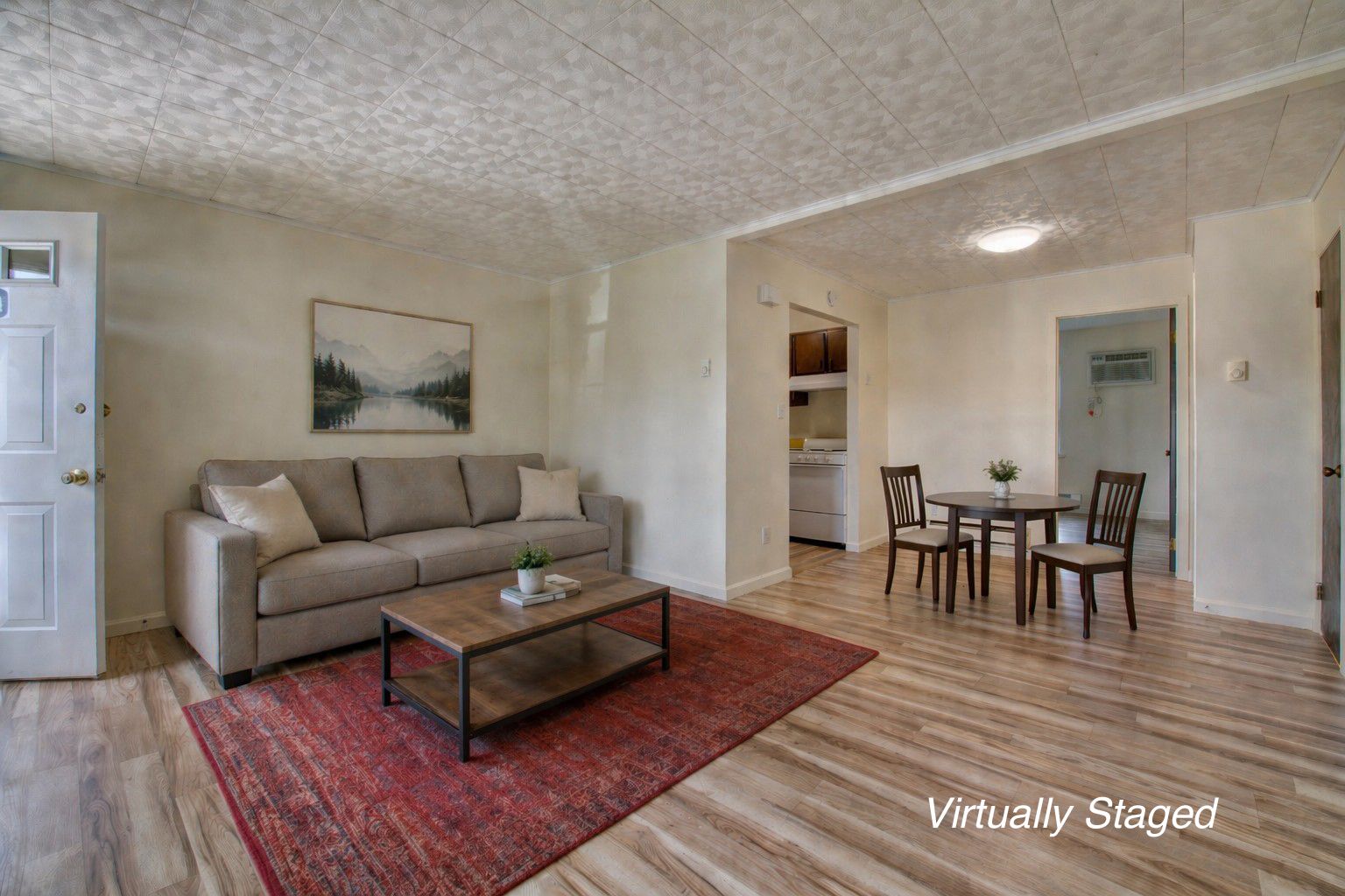  living/dining room virtually staged