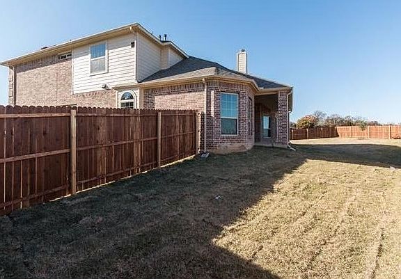 Large back yard with patio