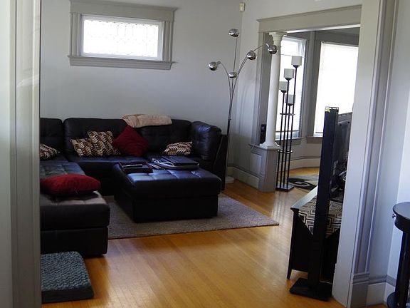 Entry hall with living room to the left.