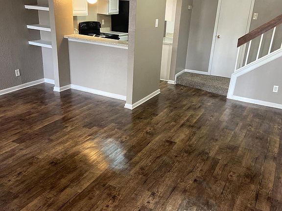Two Tone Paint and hardwood floors downstairs.