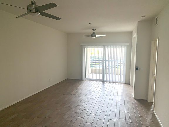 dinning and living area with two new LED fans with lighting