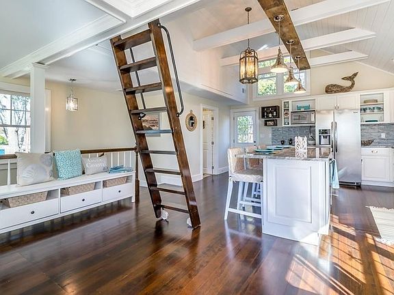 Ladder slides and folds up