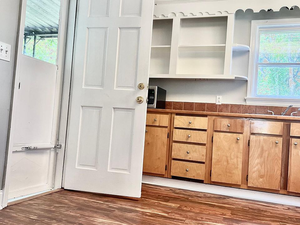 Kitchen and access to back porch/ yard