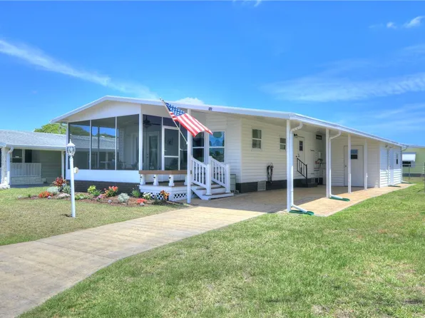 948 Frangi Pani Dr, Barefoot Bay, FL 32976
