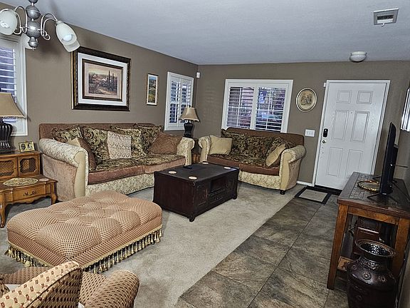 The front living room has a 54" TV with Netflix, Hulu, Disney+, Pluto and more.