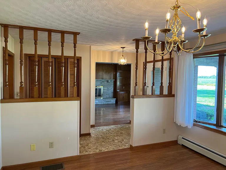 Dining Room, bay window on right, looking thru Hall and into Living Room