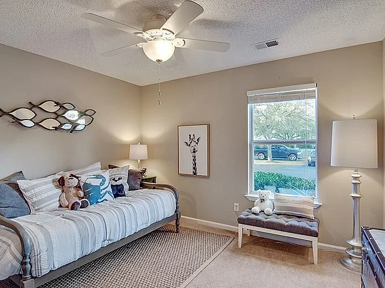 Bedroom with carpet