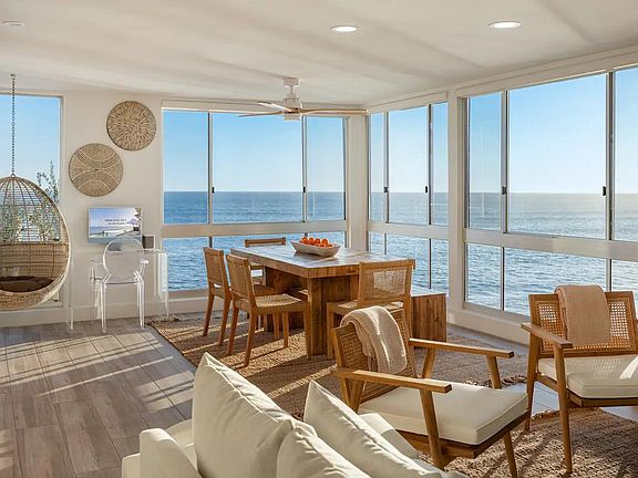 Savor the moment in the dining room, where ocean views create an atmosphere of timeless bliss.