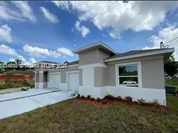 117-119 Meadow Rd, Lehigh Acres, FL 33973