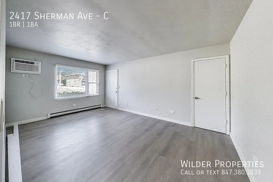 Building Photo - 2417 Sherman Ave #C