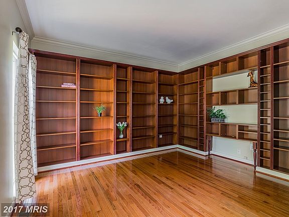 Wonderful library/living room with built ins!