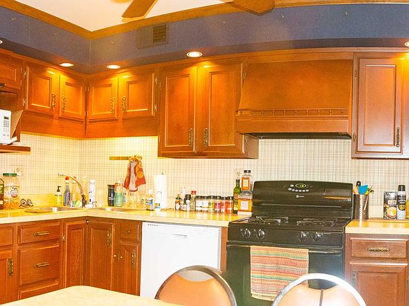 Large eat-in kitchen with dishwasher, range, fridge, and microwave