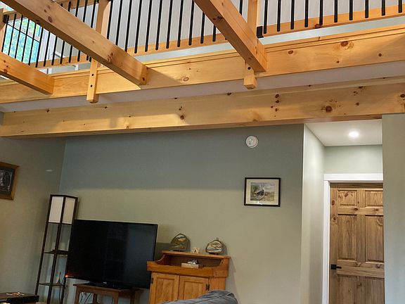 Vaulted ceiling, with living space above.