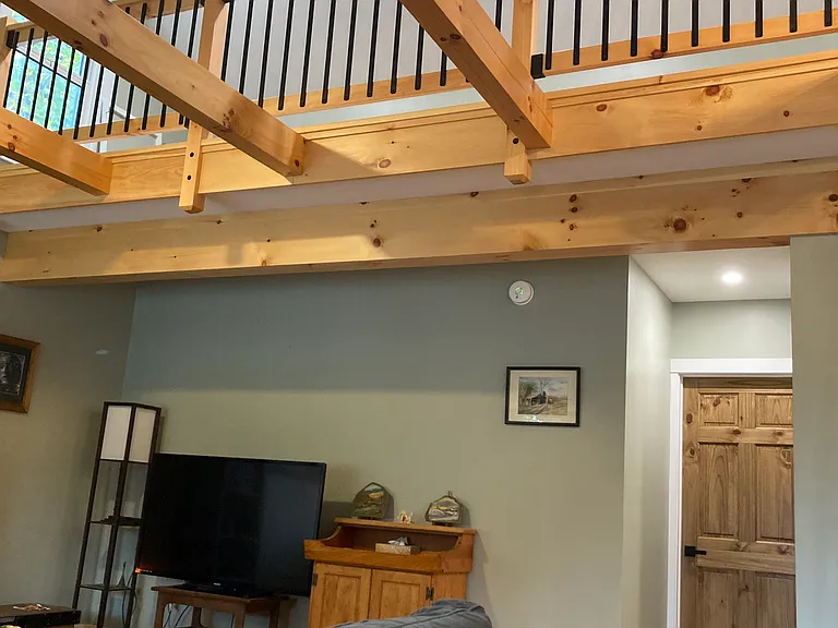 Vaulted ceiling, with living space above.