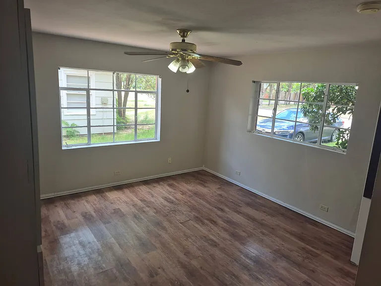 Master bedroom. Showing windows on front and east (driveway) side.
