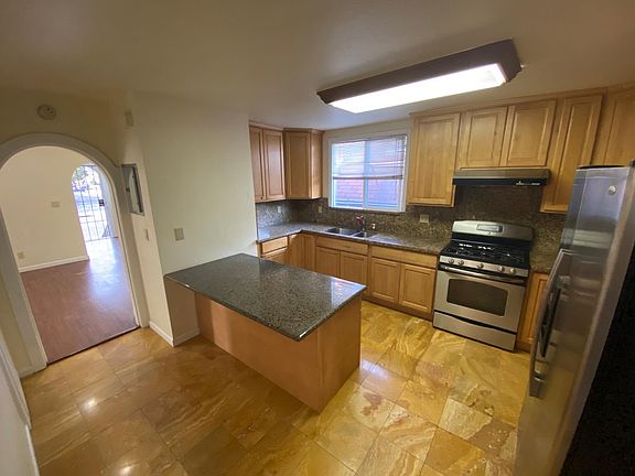 Spacious kitchen with lots of cabinets and counter space