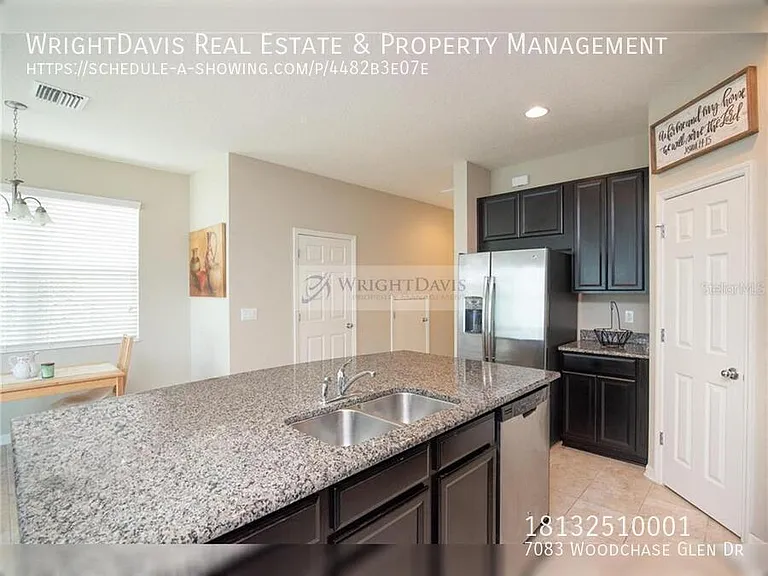 7083 Woodchase Glen Dr — Photo 5