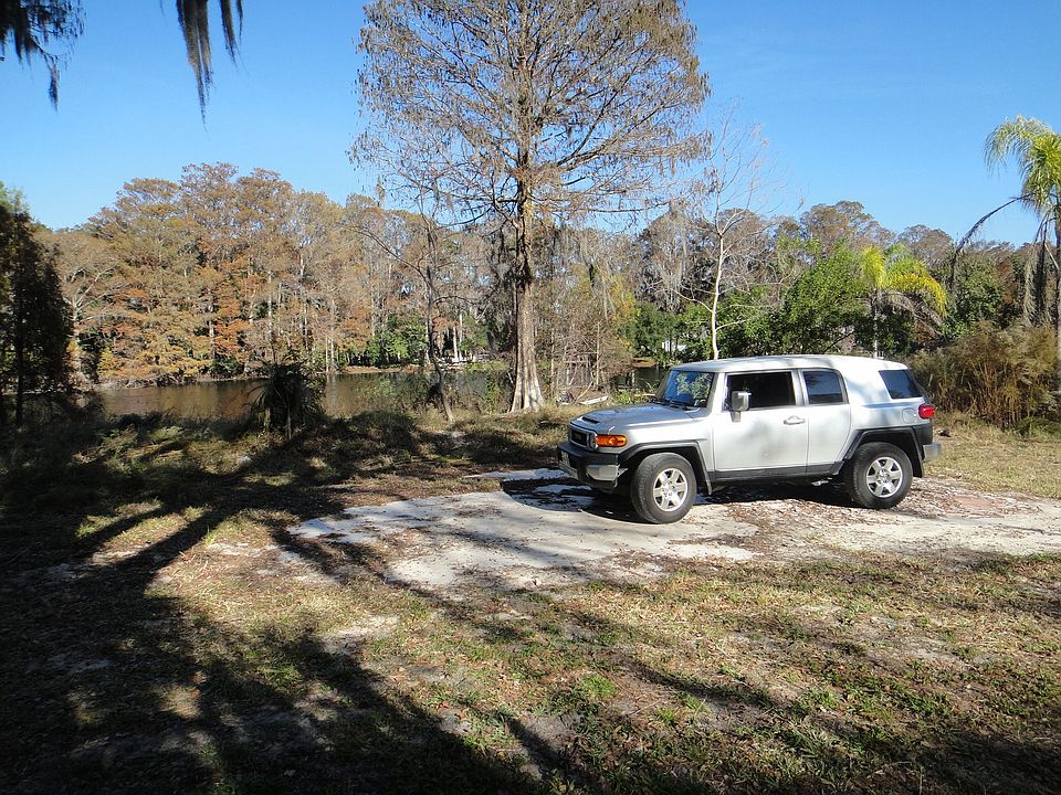 Vehicle is for lot size comparison; Parked in center of property. 