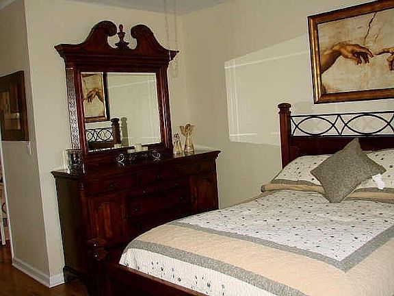 The master hallway features a full bath, washer/dryer, and walk in closet.