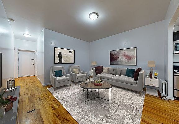 3rd image of 123 E 7th St APT 1A