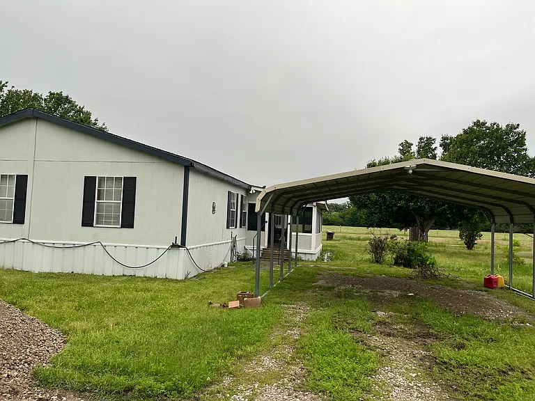 A Carport around the back of the house for parking!