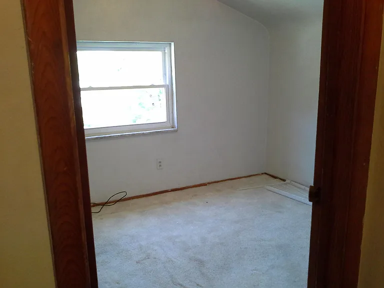 2nd bedroom or workspace roo) has closet to left that is not shown.