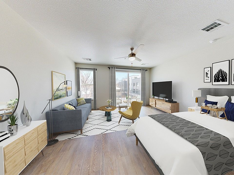 Studio home with wood plank-style flooring throughout