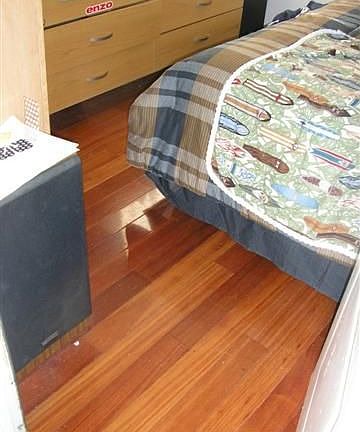 Hardwood floors in 1 of the bedrooms in the Rear home